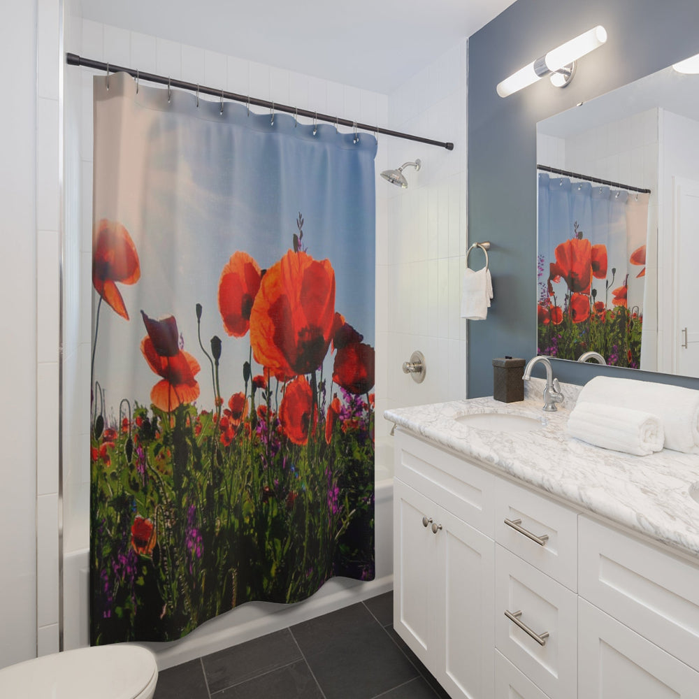 Bathroom with a floral shower curtain featuring red poppies.