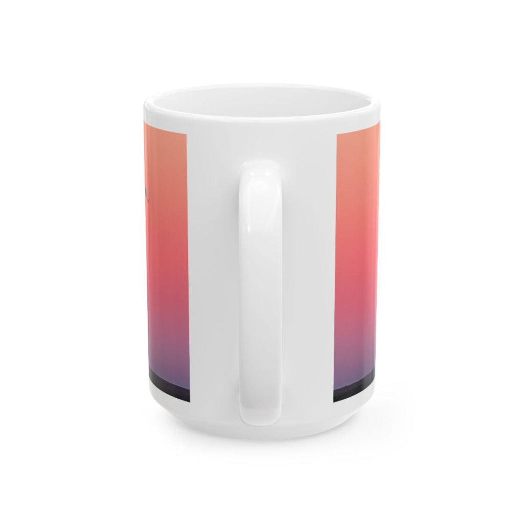 Handle of white mug with a colorful gradient design on a white background