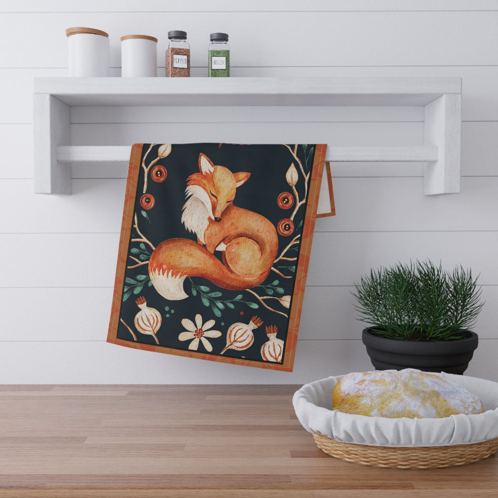 Adorable fox on a dark background with a vibrant floral pattern hanging in a kitchen.