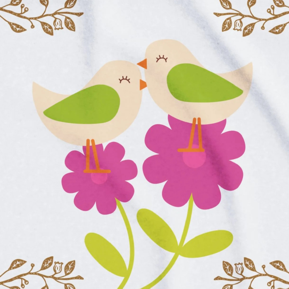 white blanket with bright pink flowers and adorable little birds