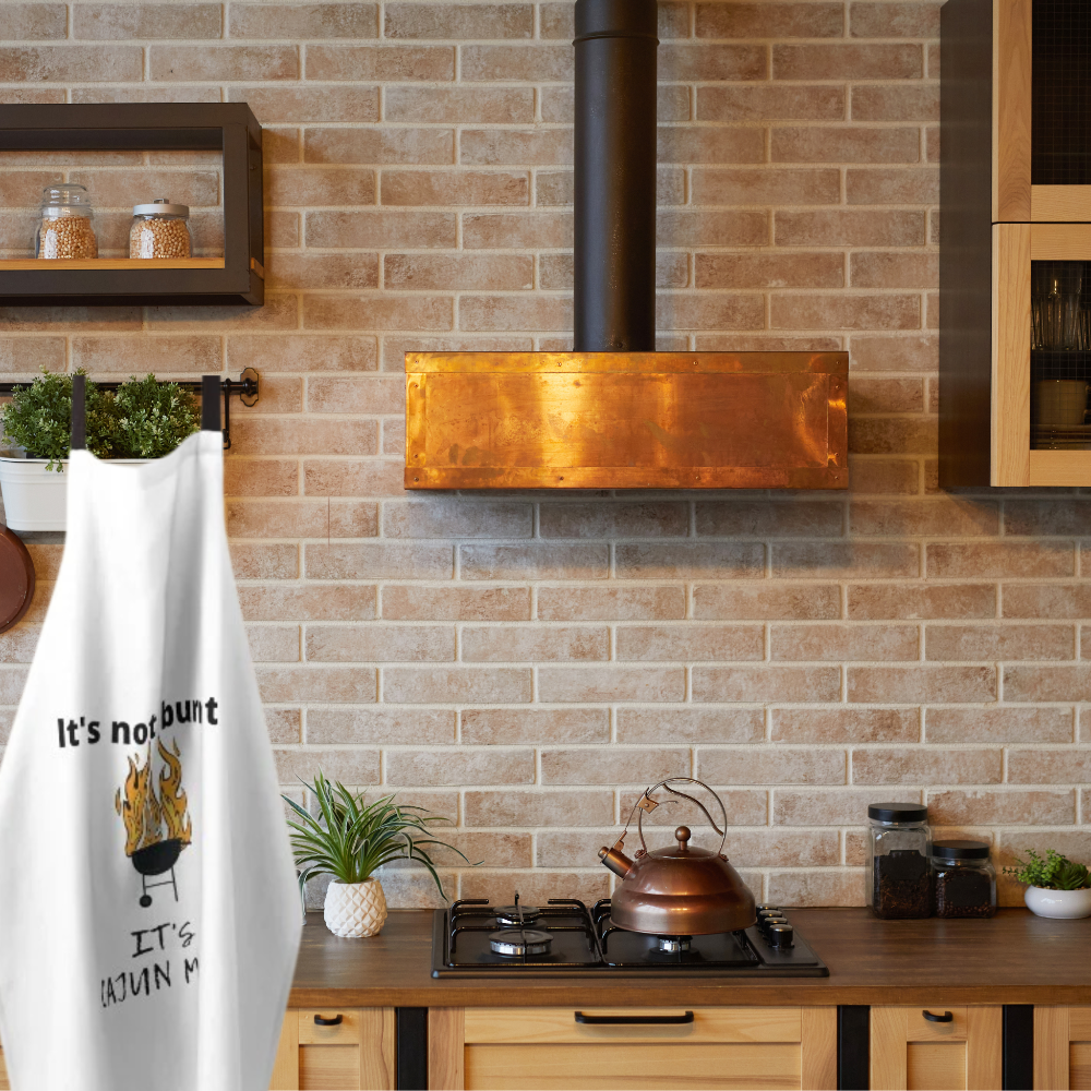 shown in a farmhouse style kitchen with a copper range hood