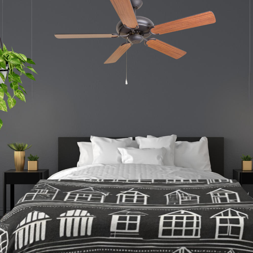 Home Sweet Home Comforter shown in a dark bedroom with a wooden ceiling fan.