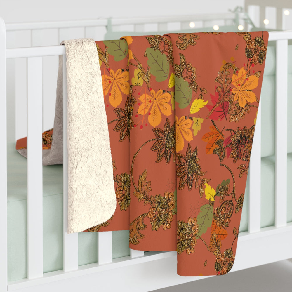 Floral-patterned blanket draped over a white crib