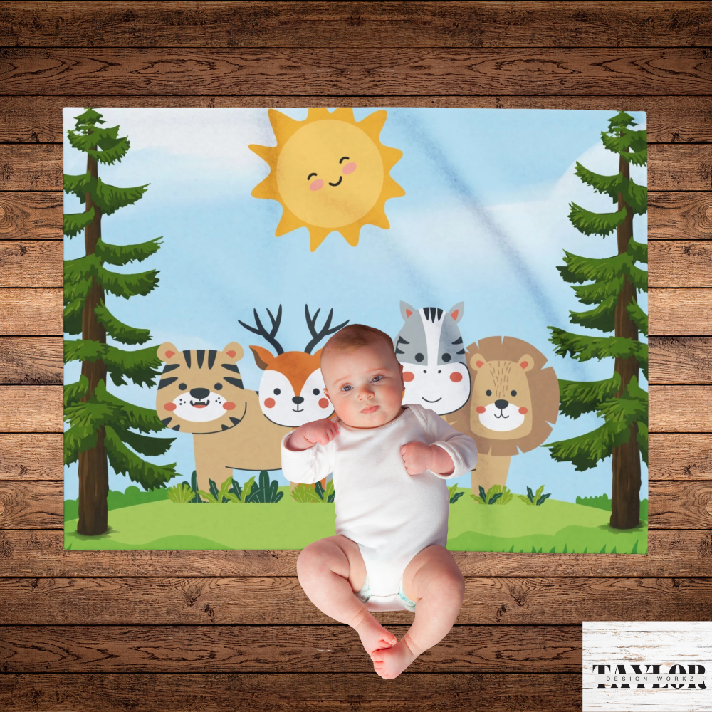 Blanket featuring friendly forest creatures in a nature background with a baby lying on top