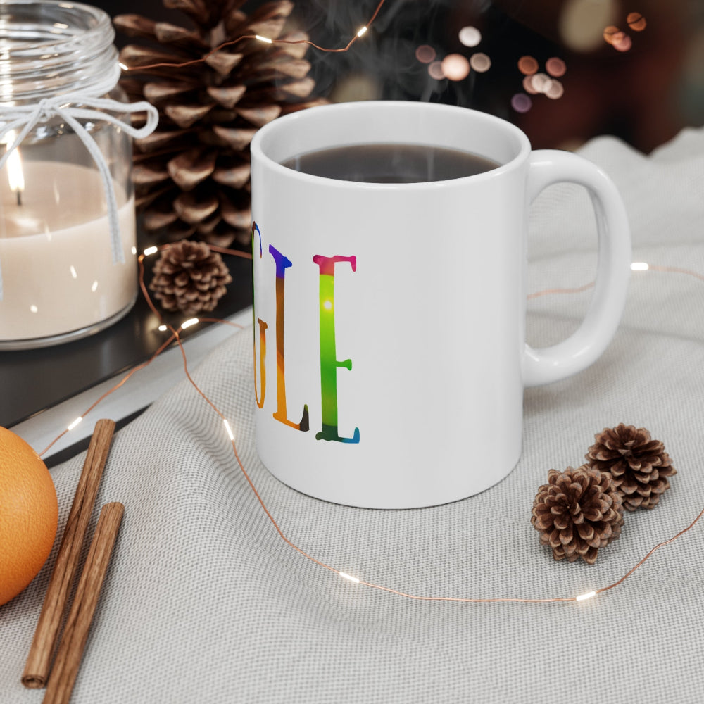White mug with brightly colored lettering with the word giggle