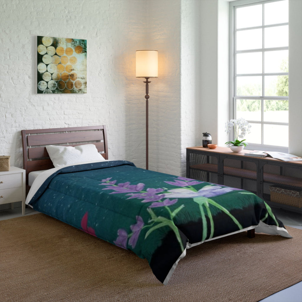 teal and lavender comforter shown on a twin size bed