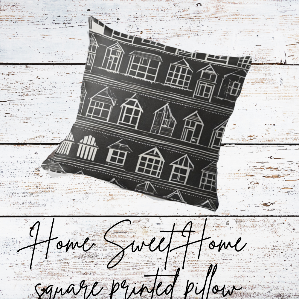 Decorative pillow with house pattern on a wooden surface, featuring the text 'Home Sweet Home square printed pillow'.