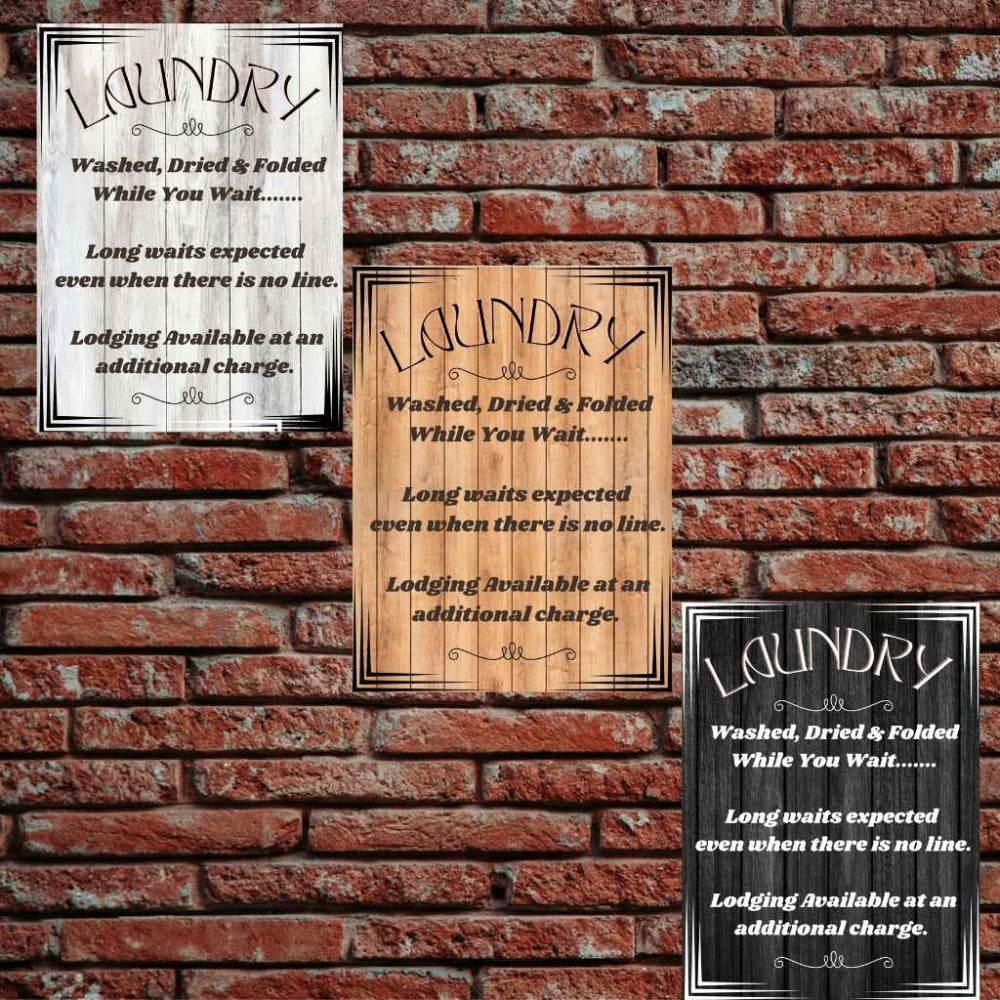 All three signs with 'Laundry' text on a brick wall background