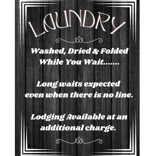 Laundry sign with humorous text on a black background