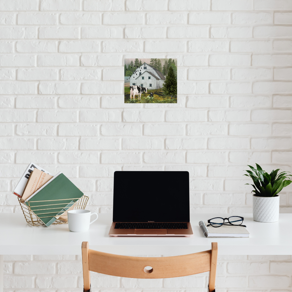 Nostalgic Barn landscape art with black and white Holstein cows shown in a home office setting