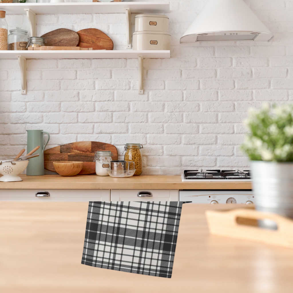 Shown in a farmhouse style kitchen on a wood countertop