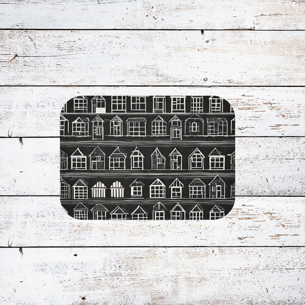 home sweet home rug featuring little white houses on a black background, shown on a white wood floor