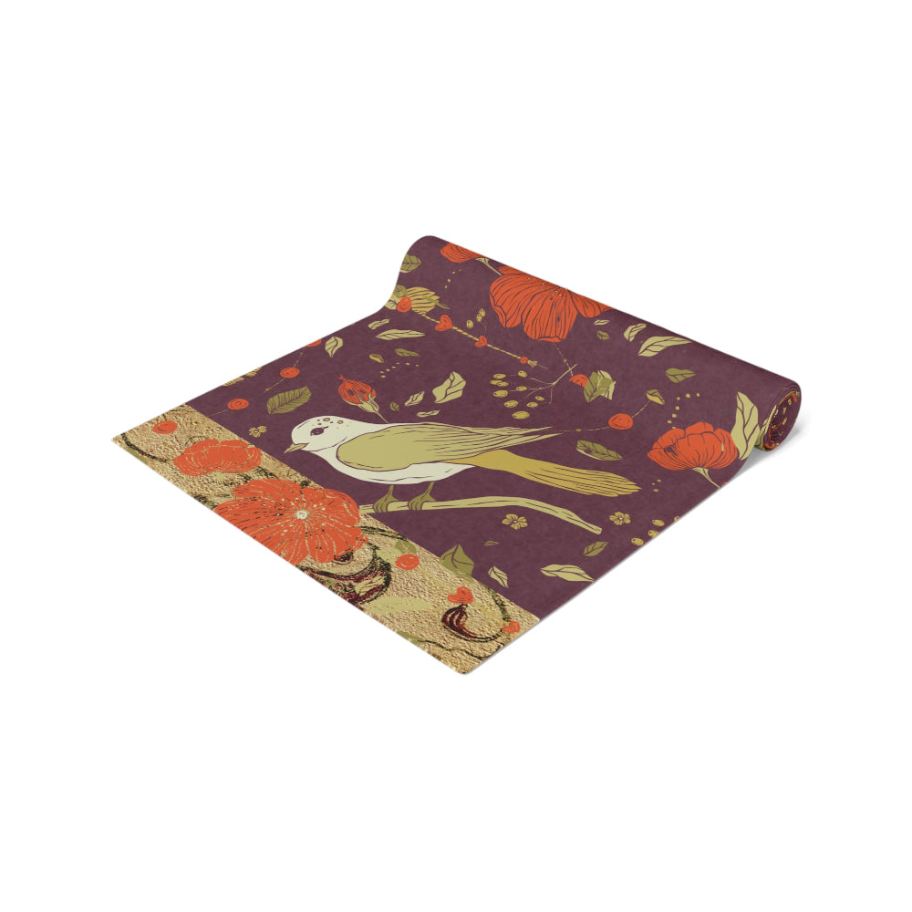 Closeup of Fall Runner with a bird and floral pattern in rich tones of plum, green and orange shown on a plain white background