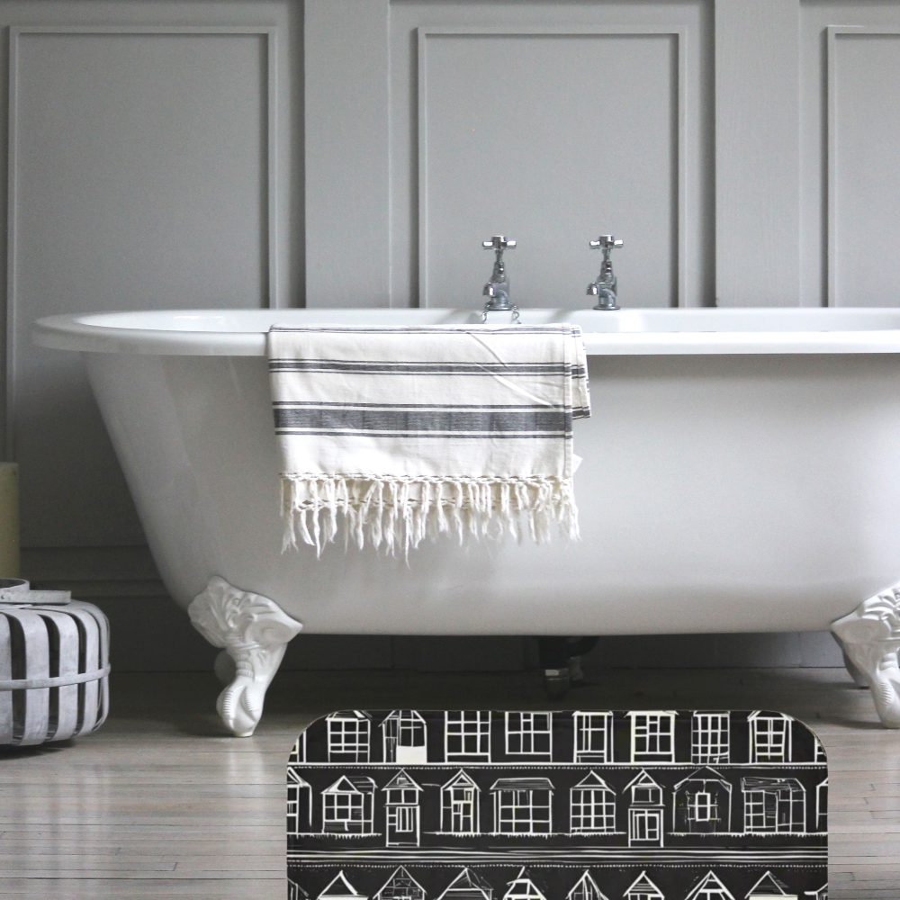 Farmhouse Rug Home Sweet Home by Taylor Design Workz featuring a black rug with little white houses in front of a beautiful bathtub.