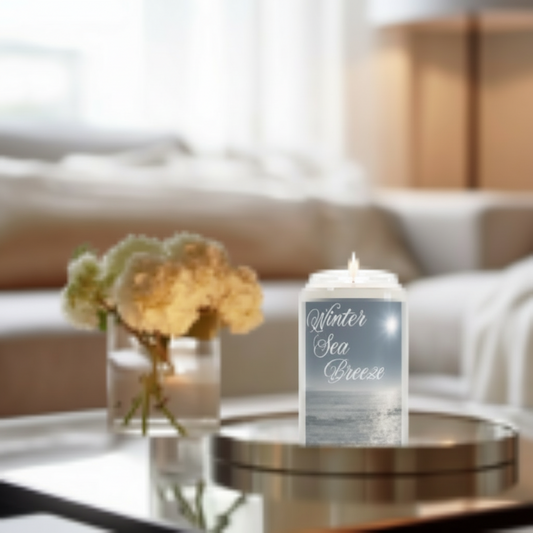 Winter Sea Breeze Candle on a table with flowers in the background
