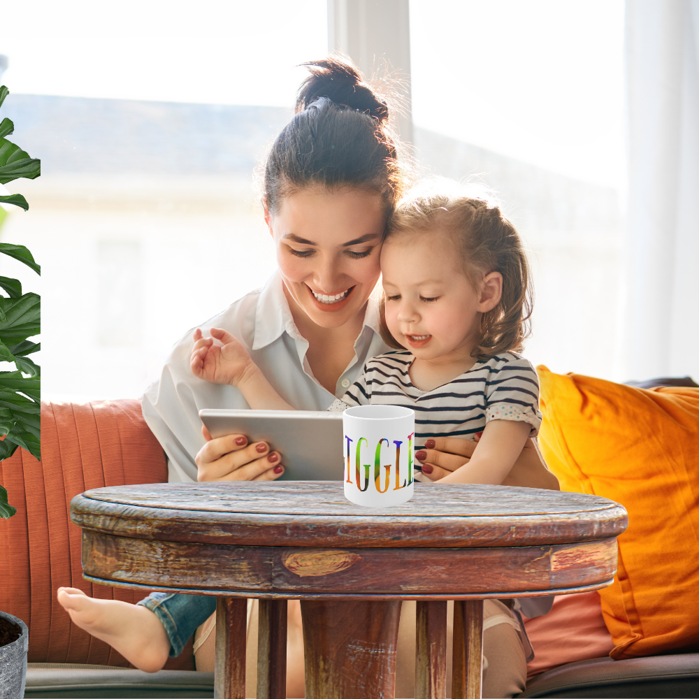 Bright colored giggle mug shown with a woman reading to a  child