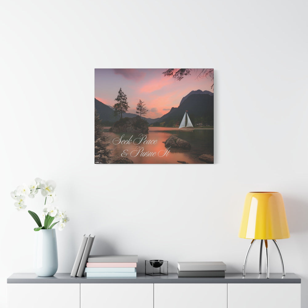 Canvas print of a scenic landscape with a sailboat on a wall above a shelf with decor items.