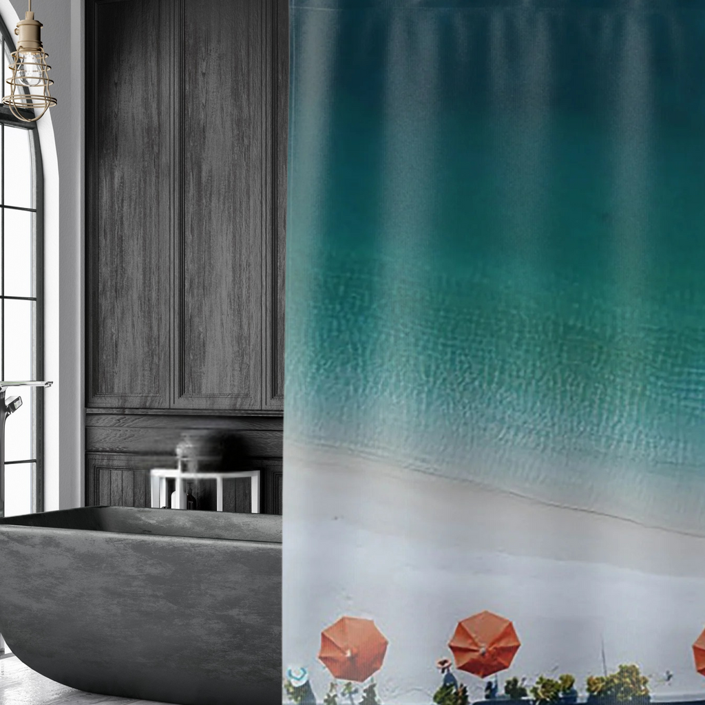 an ombre blue shower curtain with orange beach umbrellas shown in a charcoal colored bathroom