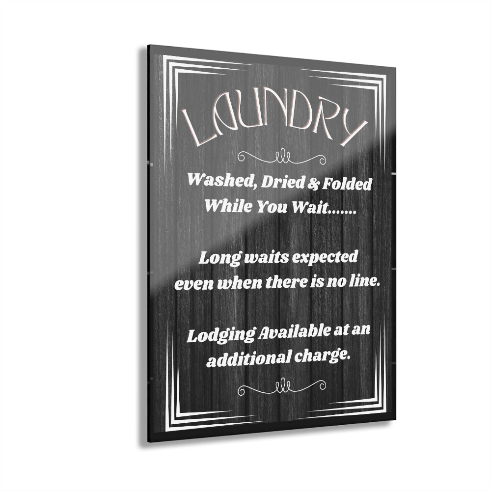 Laundry sign with humorous text on a black background