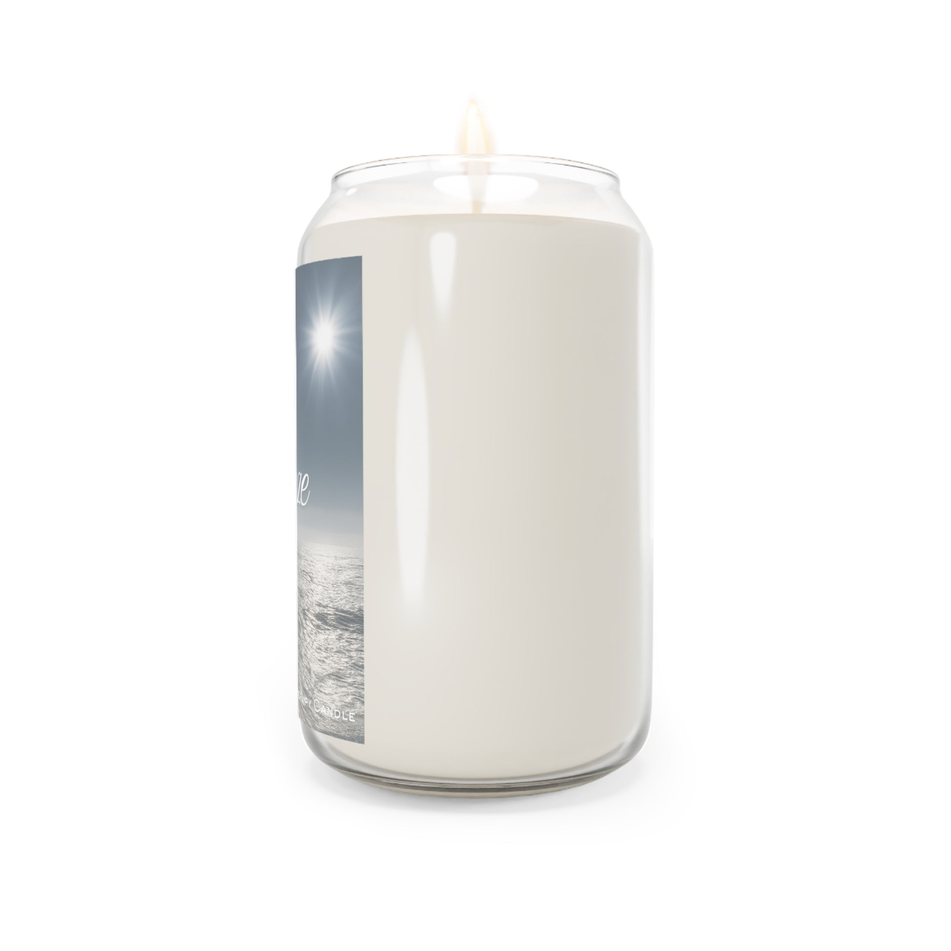 White candle in a glass jar with a label on a white background