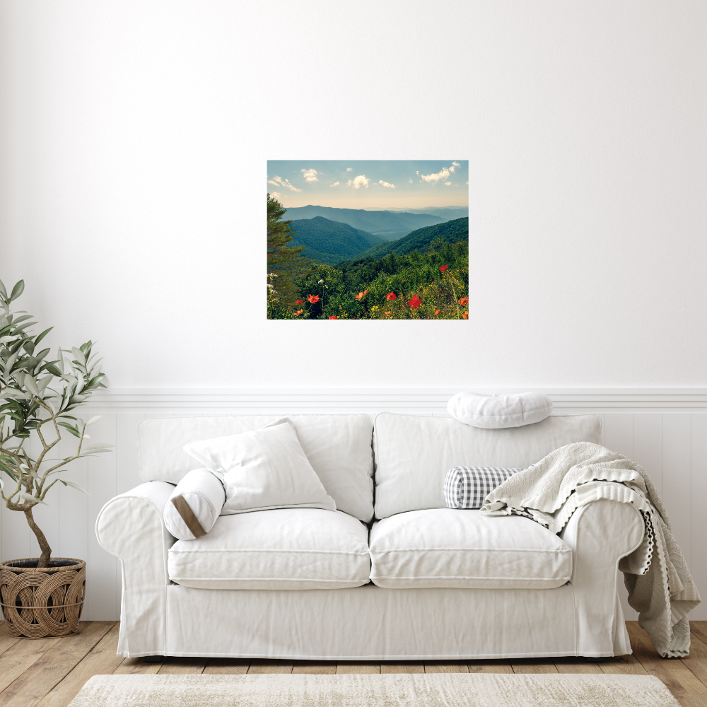 A Beautiful Day Mountain Landscape art shown in a living room with a white sofa