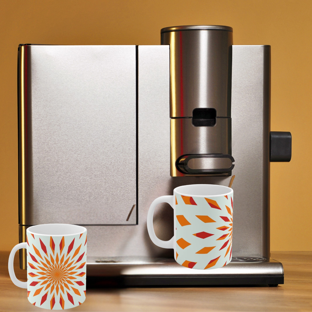 orange starburst mug shown in a coffee maker