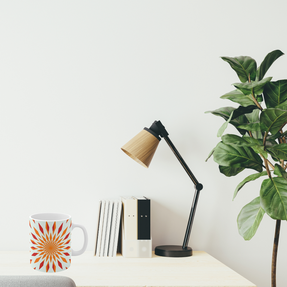 orange starburst mug shown  n an office setting
