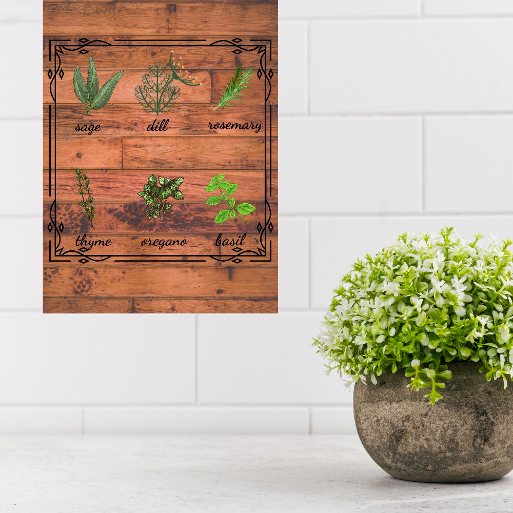 Decorative wall art with herbs and a pot of greenery on a white tiled wall.