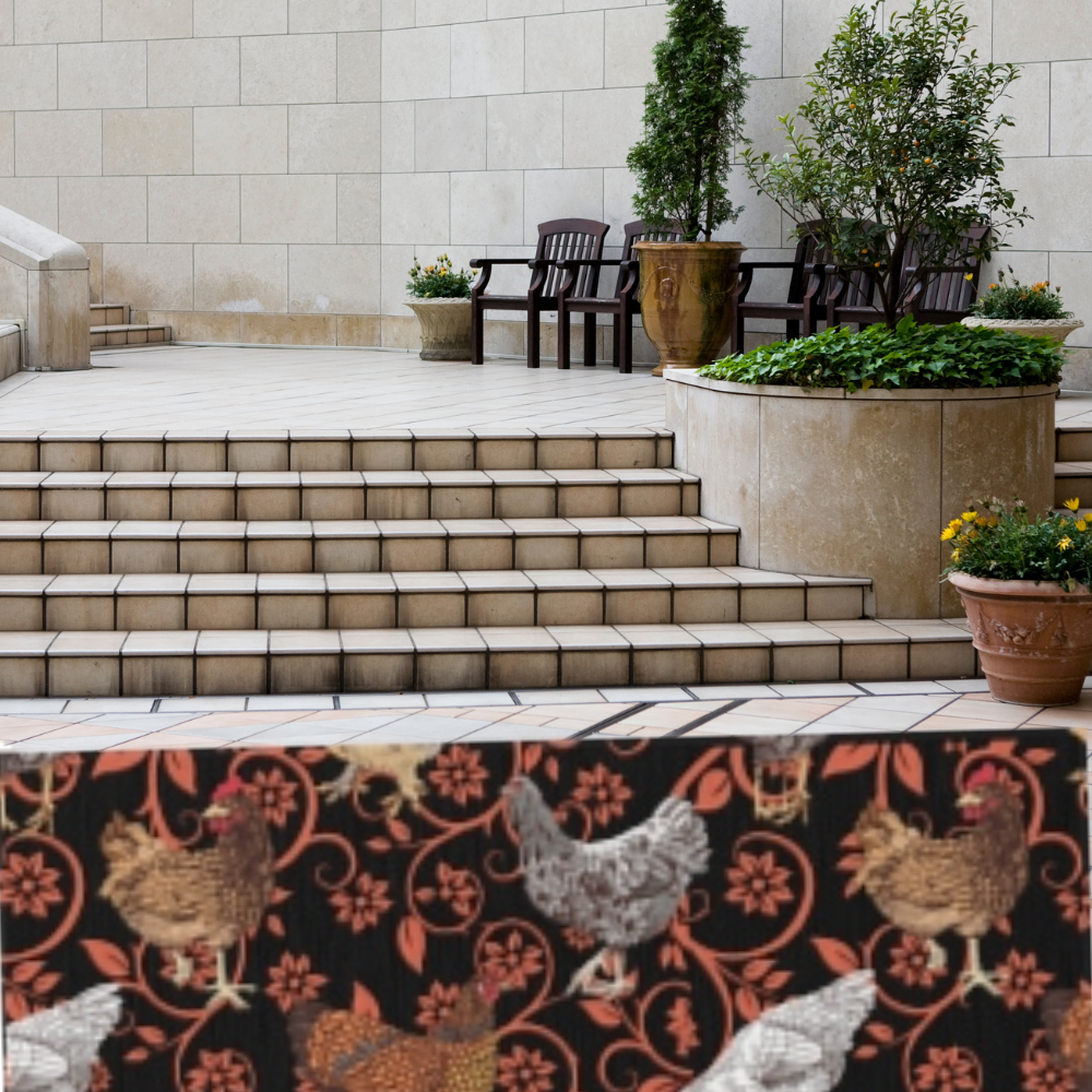 Chicken Outdoor Rug shown in front of outdoor steps leading to a patio