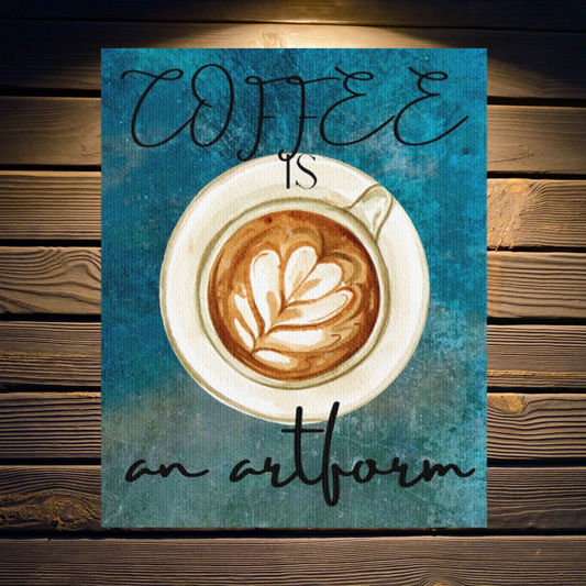 Coffee is an Artform Canvas Print Detail of decorative sign with a coffee cup and latte art on a blue watercolor background, text 'COFFEE is an artform', shown hanging on  a wooden background.