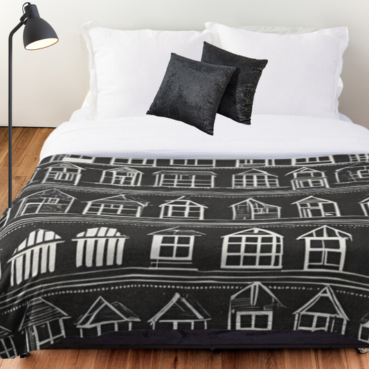 Home Sweet Home Comforter shown on a queen size bed with black throw pillows