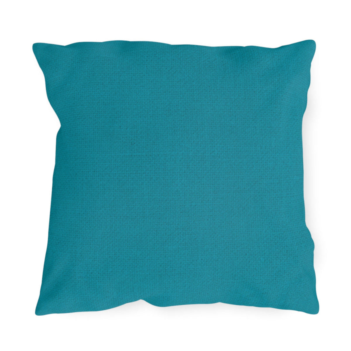 Teal pillow on a white background