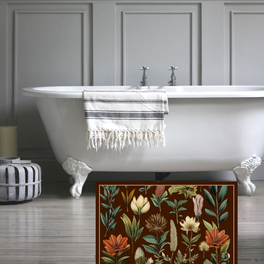 Shown in a beautiful bathroom next to a claw foot tub