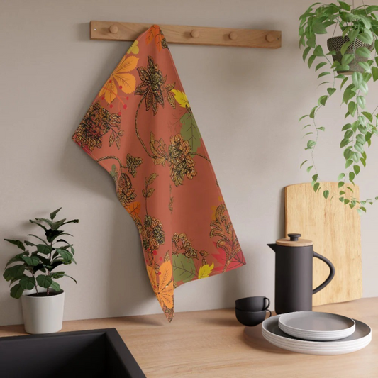 shown hanging on a rustic hook in a kitchen with kitchen accessoies