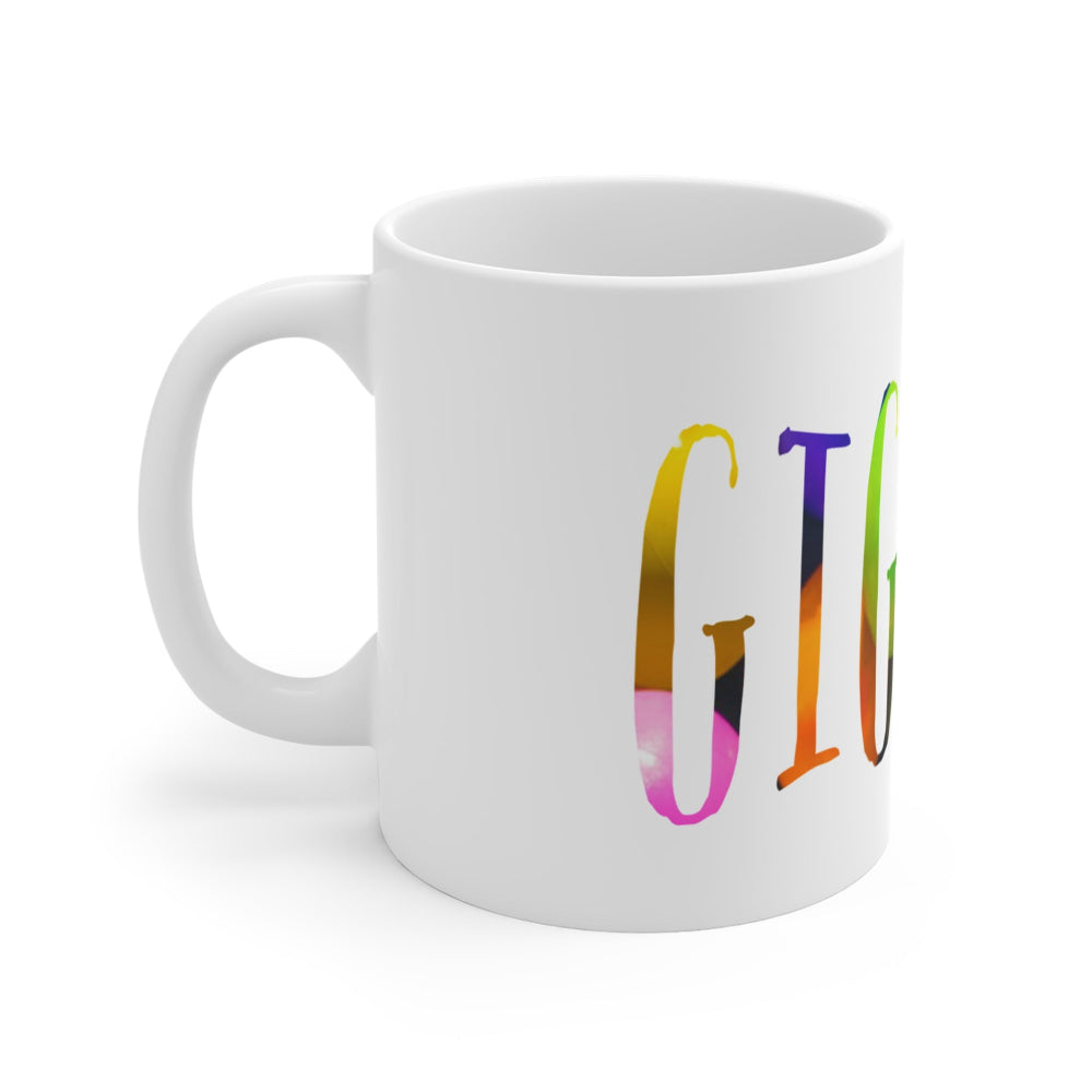 the word giggle in vivid color on a hite mug