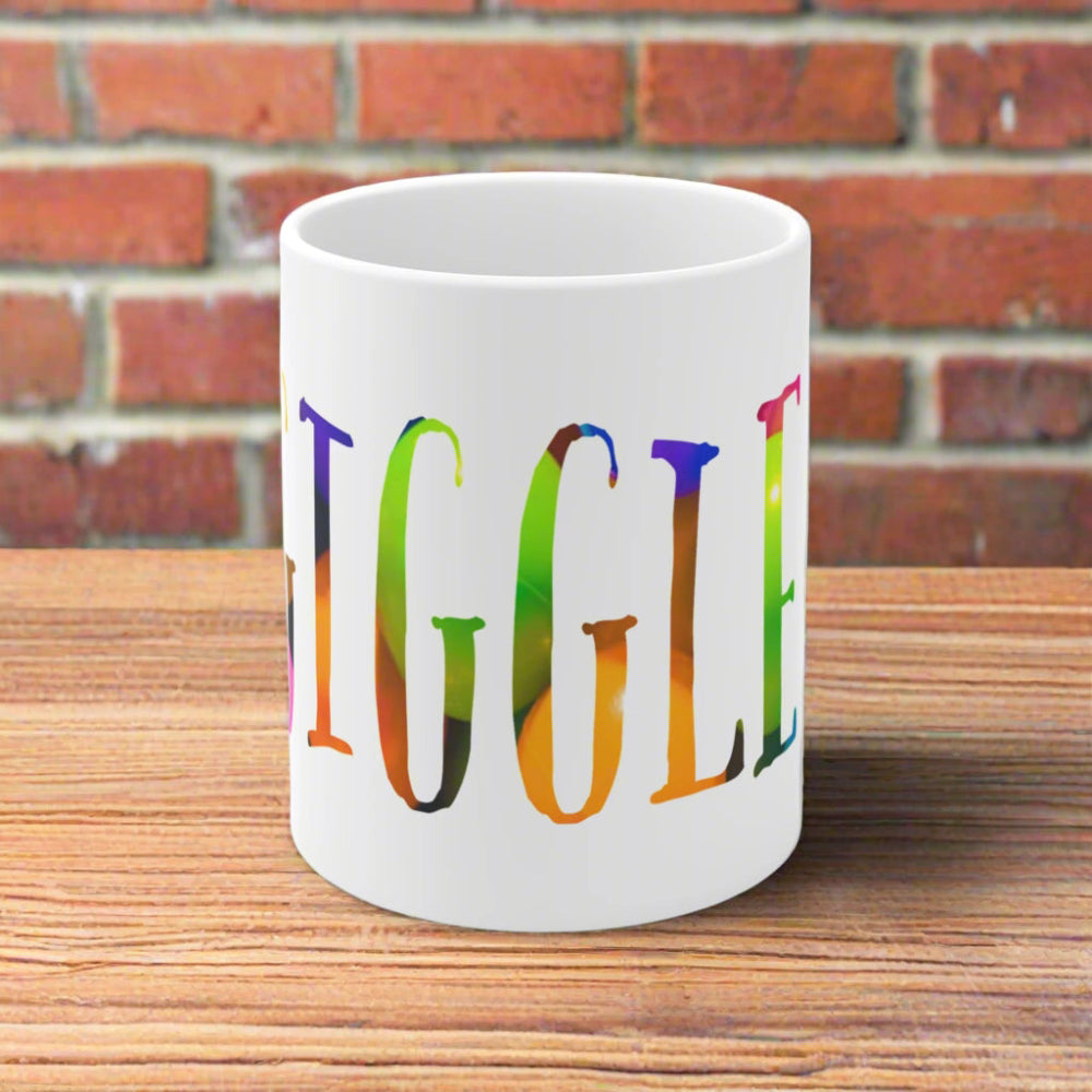 Familiar bright colored lettering with the word giggle on a whit  mug
