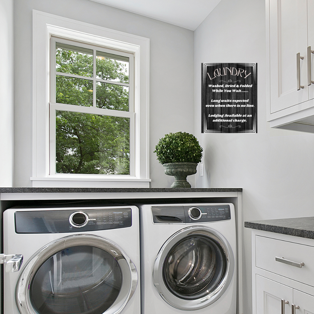 laundry while you wait sign shown in