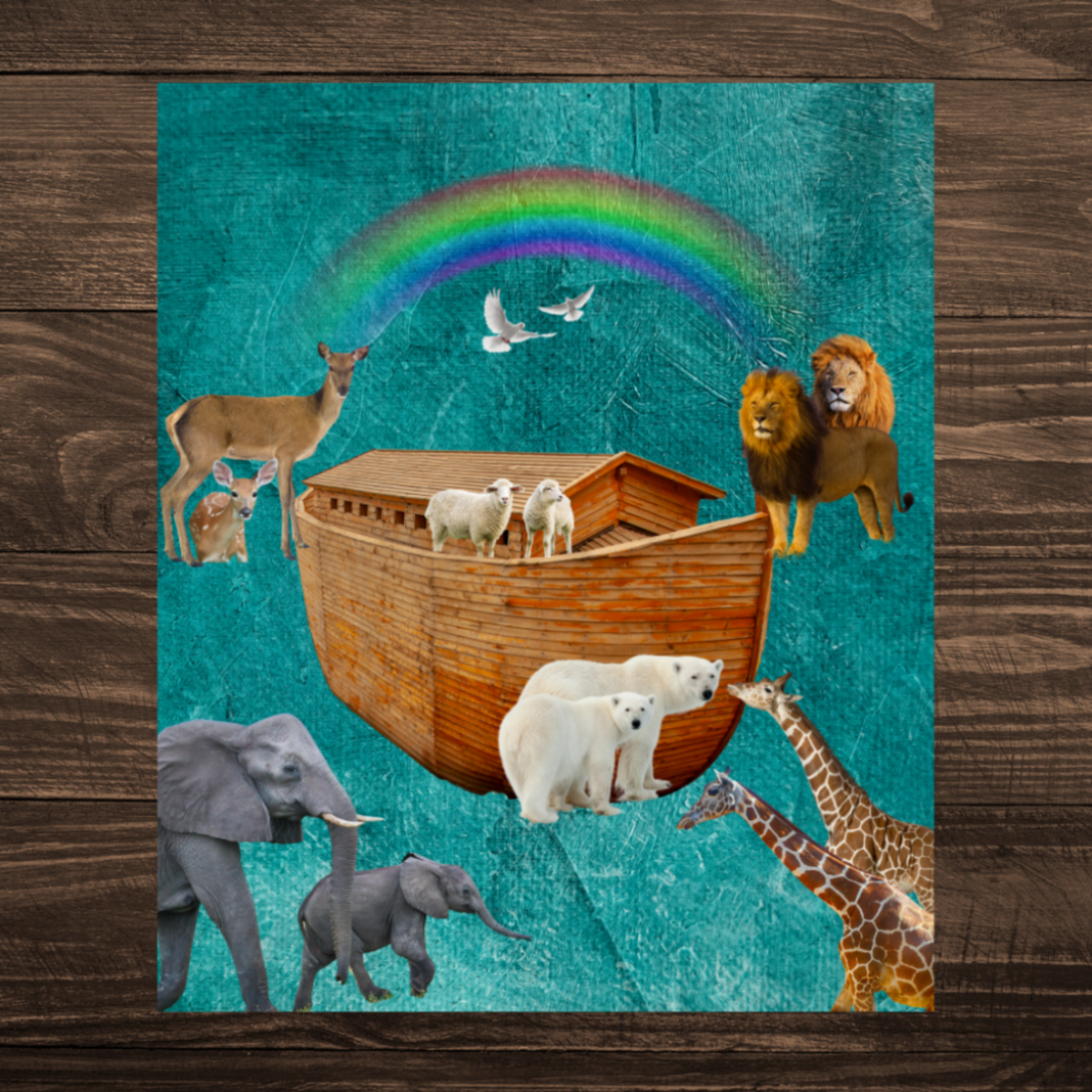 Noah' s Ark Soft Fleece Blanket with a watercolor look teal background with a rainbow, an ark and pairs of animals shown in detail on a dark wood background