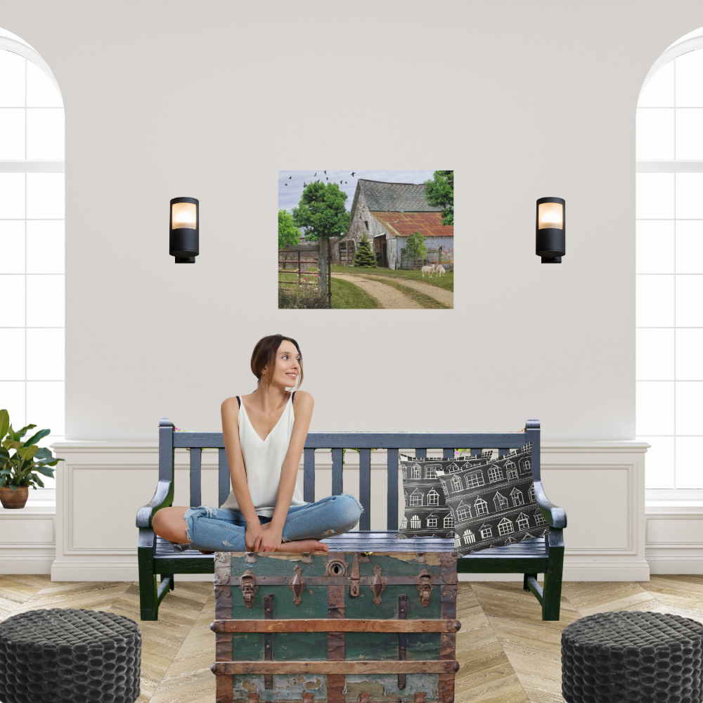 Rustic Landscape with Sheep shown in   a living room with a woman sitting on a rustic bench