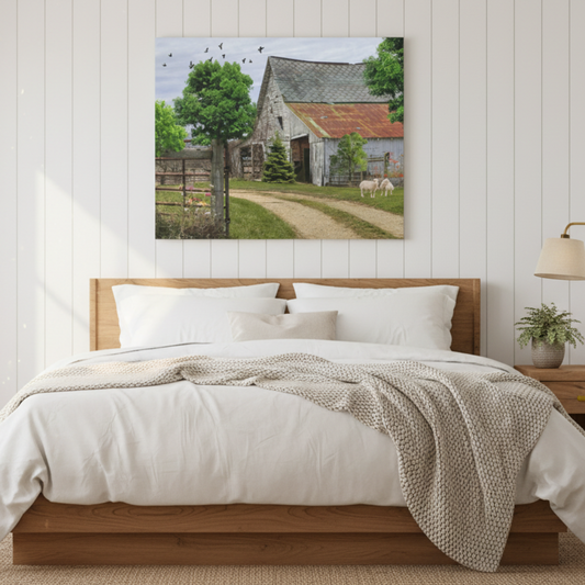 Bedroom with wooden bed, white bedding, and a scenic wall art above the bed.