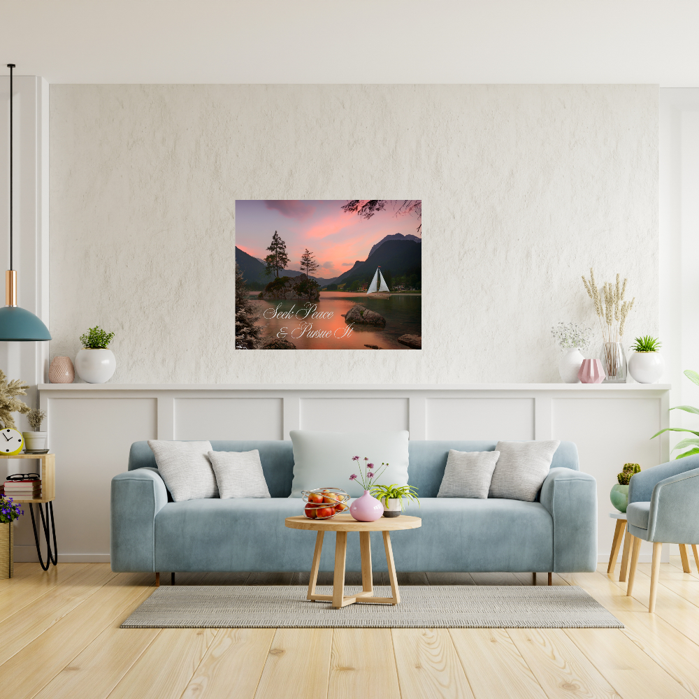 Modern living room with a blue sofa, coffee table, and wall art of a lake scene with a sailboat and the text Seek Peace and Pursue it.