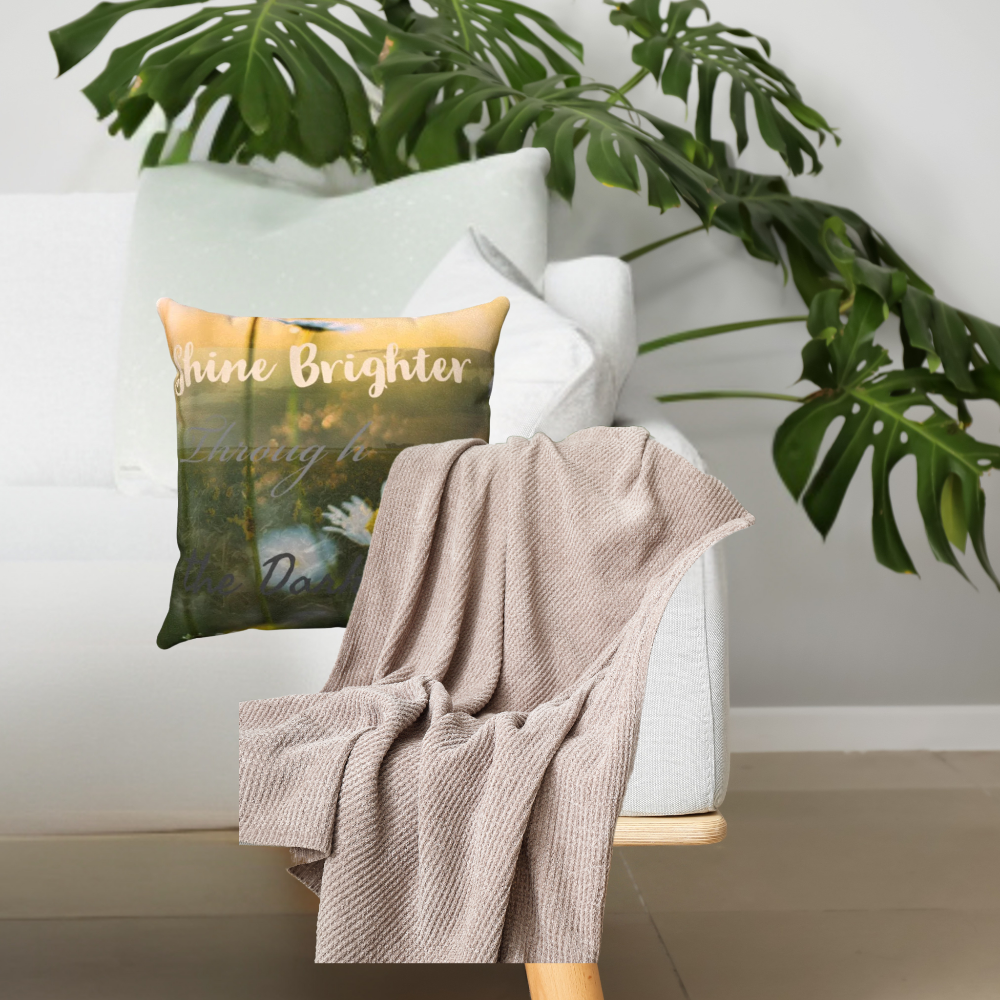 shown on a couch with a tan throw blanket