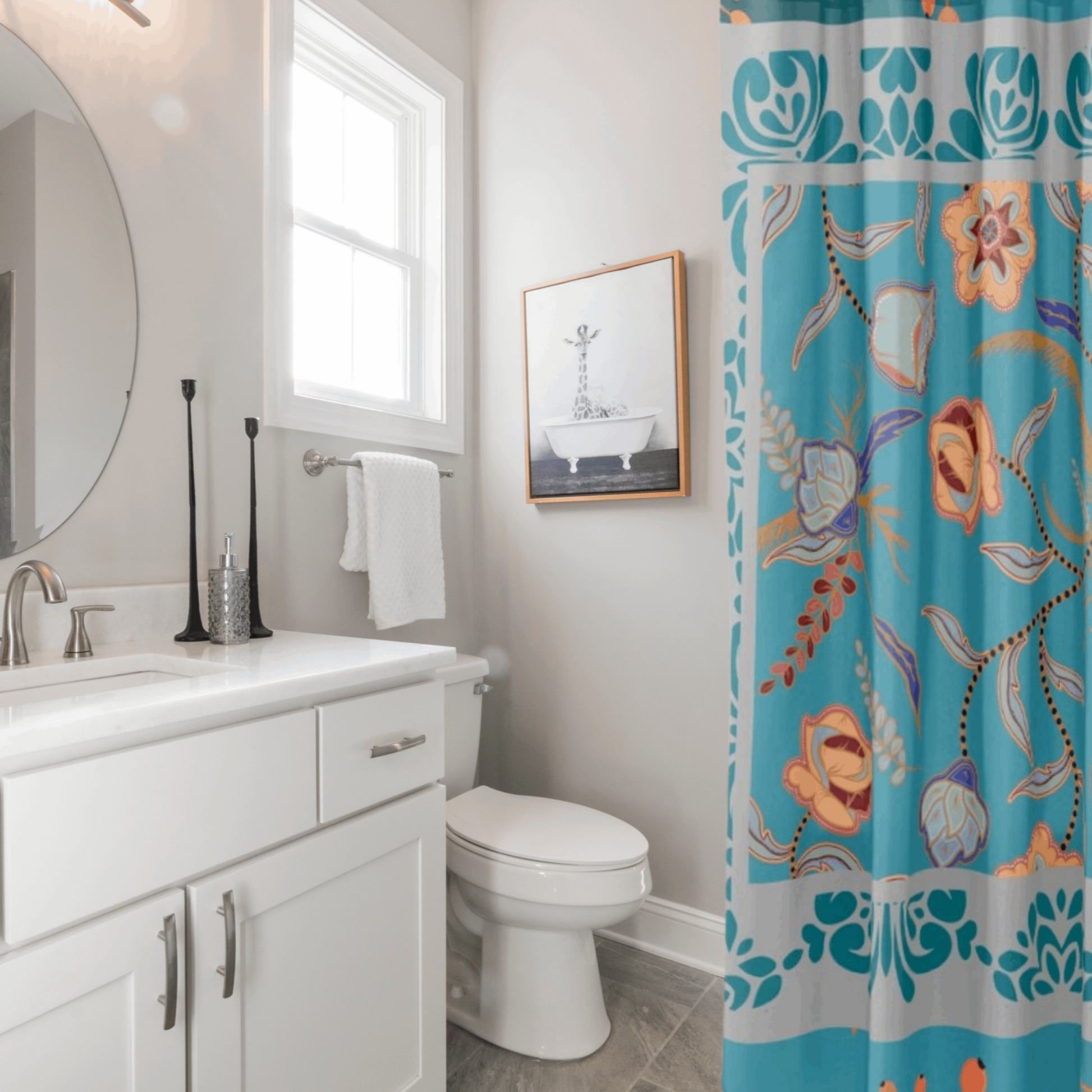 teal floral shower curtain shown in a basic white bathroom