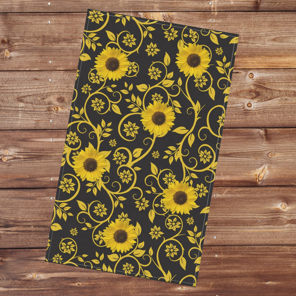 Sunflower Patterned Tea Towel shown on a wood background