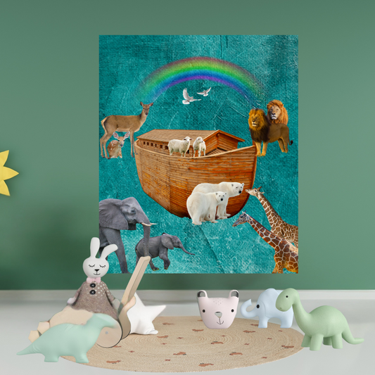 Blanket with Noah's ark on an ocean blue background shown on a green wall in a playroom