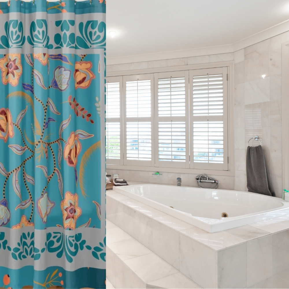 Vibrant Floral Teal and Gray Shower Curtain shown in a bright white bathroom with large windows 