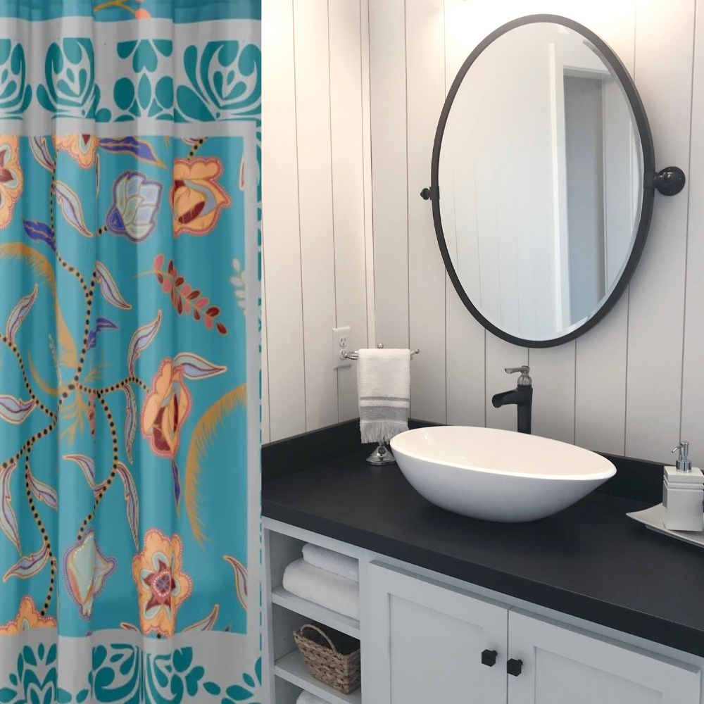 Vibrant Floral Teal and Gray Shower Curtain shown in a contemporary black and white bathroom