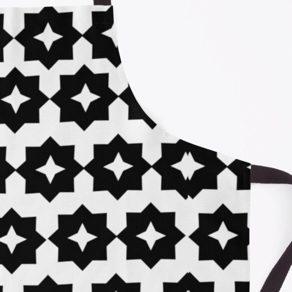 Close up showing fabric pattern of black and white geometric farmhouse apron