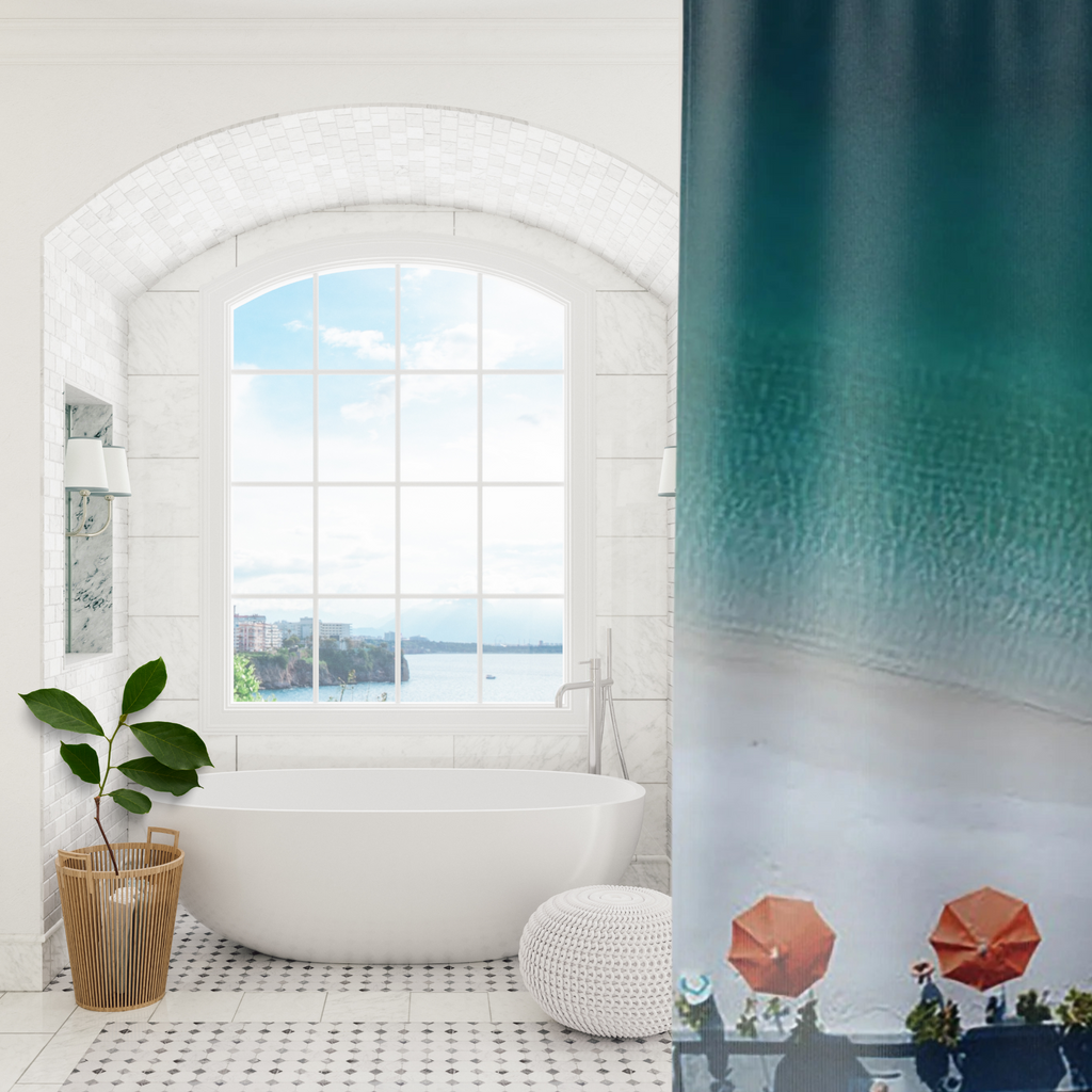 Showing a vibrant blue  ocean print ombre design shower curtain  in a luxe bath